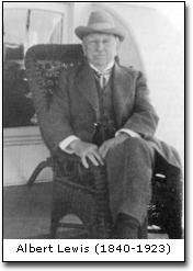 Black and white portrait of Albert Lewis (1840–1923) sitting in a wicker chair, captured as part of Bischwind Villa history, wearing a suit and hat.